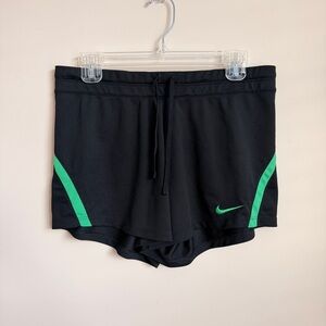 Nike Women's Athletic Shorts in Black with Green Accents